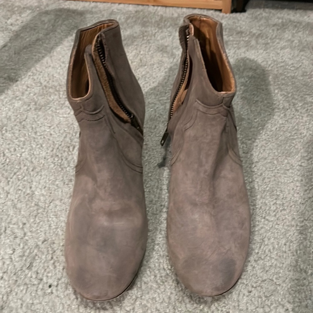 Beige ankle bootie. Slightly worn.